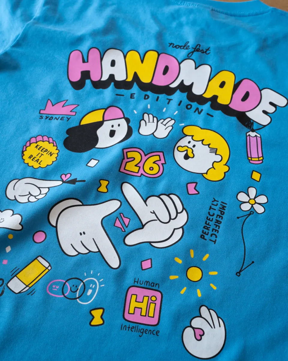Close-up of the blue NodeFest Handmade Edition tee print